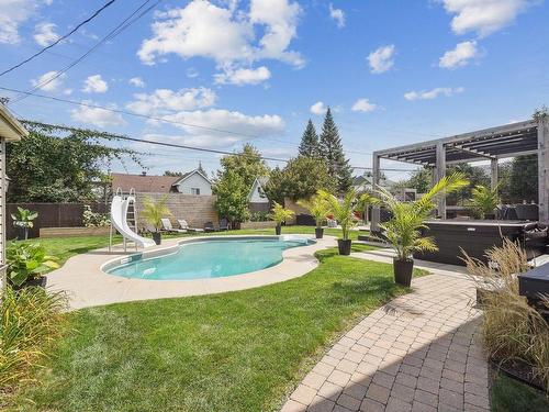 Backyard - 45 Rue Jean-Paul-Lemieux, Notre-Dame-De-L'Île-Perrot, QC - Outdoor With In Ground Pool