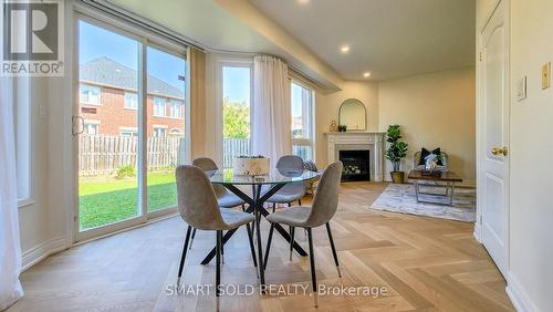 82 Edward Jeffreys Avenue, Markham, ON - Indoor Photo Showing Dining Room With Fireplace