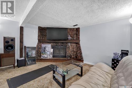 3515 Fairlight Drive, Saskatoon, SK - Indoor Photo Showing Living Room With Fireplace