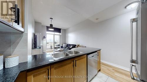 701 - 18 Kenaston Gardens, Toronto, ON - Indoor Photo Showing Kitchen With Double Sink