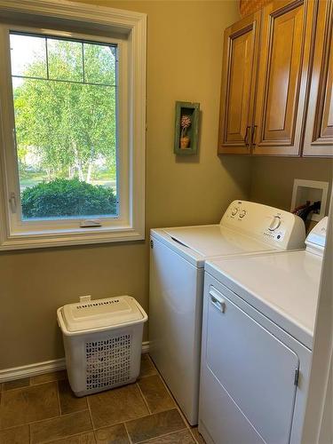 3 83 Highway, Swan River, MB - Indoor Photo Showing Laundry Room