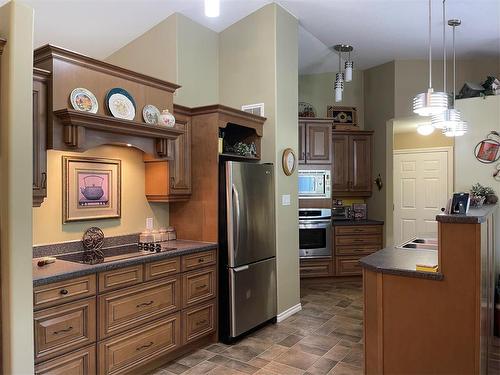 3 83 Highway, Swan River, MB - Indoor Photo Showing Kitchen With Double Sink