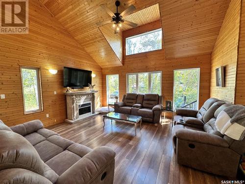 116 White Birch Drive, Lucien Lake, SK - Indoor Photo Showing Living Room With Fireplace