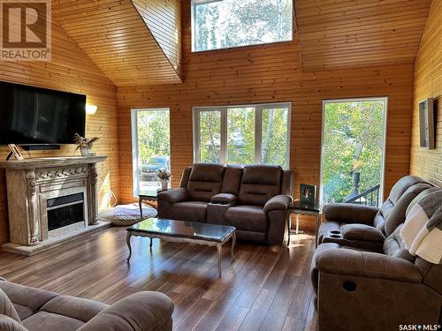 116 White Birch Drive, Lucien Lake, SK - Indoor Photo Showing Living Room With Fireplace