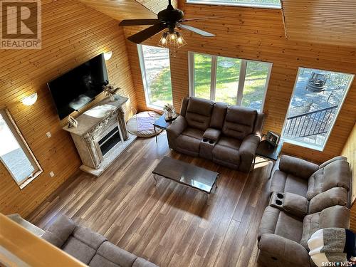 116 White Birch Drive, Lucien Lake, SK - Indoor Photo Showing Living Room With Fireplace