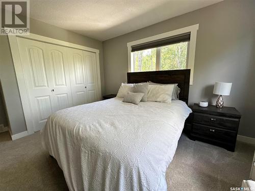 116 White Birch Drive, Lucien Lake, SK - Indoor Photo Showing Bedroom