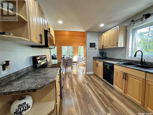 116 White Birch Drive, Lucien Lake, SK - Indoor Photo Showing Kitchen With Double Sink