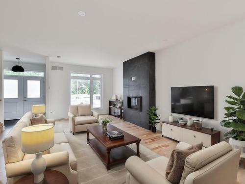 Salon - 1223 Rue Des Îles, Saint-Jérôme, QC - Indoor Photo Showing Living Room With Fireplace