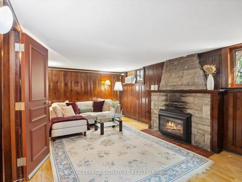 35 Courcelette Rd, Toronto, ON - Indoor Photo Showing Living Room With Fireplace