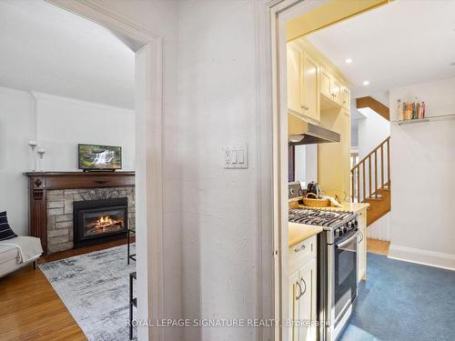 35 Courcelette Rd, Toronto, ON - Indoor Photo Showing Living Room With Fireplace