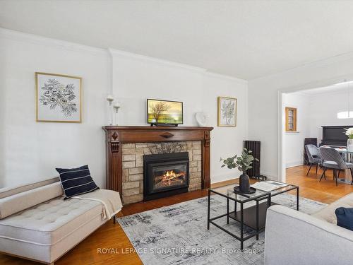 35 Courcelette Rd, Toronto, ON - Indoor Photo Showing Living Room With Fireplace