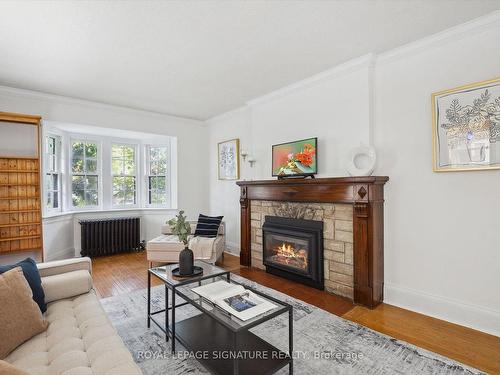 35 Courcelette Rd, Toronto, ON - Indoor Photo Showing Living Room With Fireplace