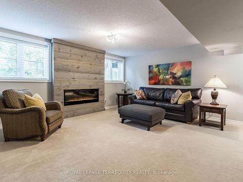 6477 Rivergate Pl, Mississauga, ON - Indoor Photo Showing Living Room With Fireplace