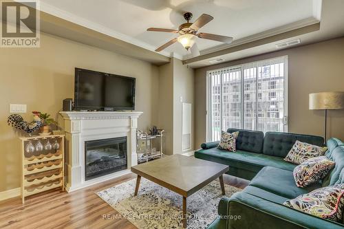 914 - 1030 Coronation Drive, London, ON - Indoor Photo Showing Living Room With Fireplace