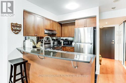 911 - 230 King Street E, Toronto (Moss Park), ON - Indoor Photo Showing Kitchen With Stainless Steel Kitchen With Double Sink