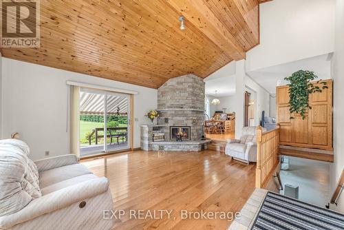 2106 County Road 30 Road N, Brighton, ON - Indoor Photo Showing Living Room With Fireplace