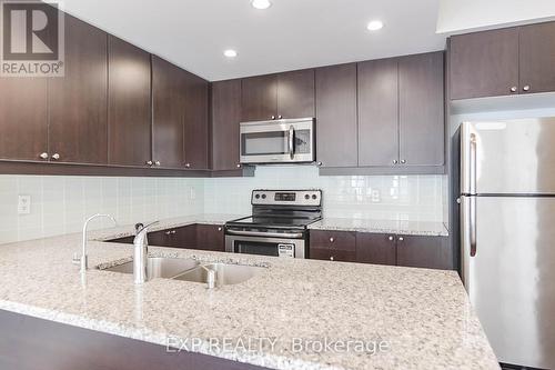 913E - 8110 Birchmount Road, Markham (Unionville), ON - Indoor Photo Showing Kitchen With Stainless Steel Kitchen With Double Sink With Upgraded Kitchen