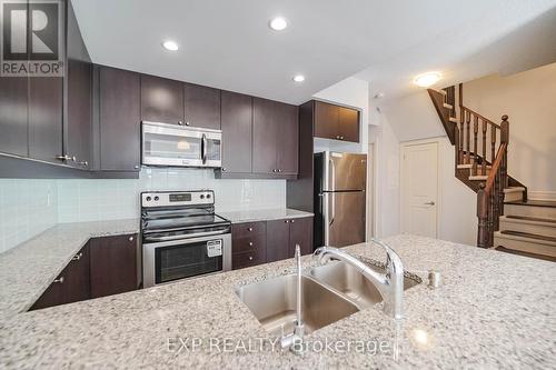 913E - 8110 Birchmount Road, Markham (Unionville), ON - Indoor Photo Showing Kitchen With Stainless Steel Kitchen With Double Sink With Upgraded Kitchen