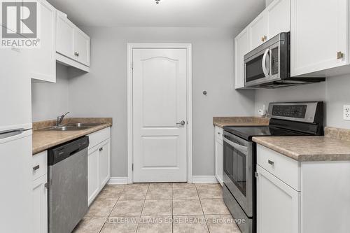 113 - 6350 Dorchester Road E, Niagara Falls (Dorchester), ON - Indoor Photo Showing Kitchen With Double Sink