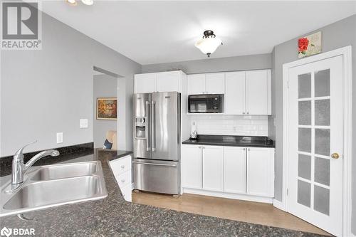 342 South Leaksdale Circle, London, ON - Indoor Photo Showing Kitchen With Double Sink