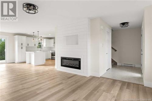 257 Falcon Drive, Moncton, NB - Indoor Photo Showing Living Room With Fireplace