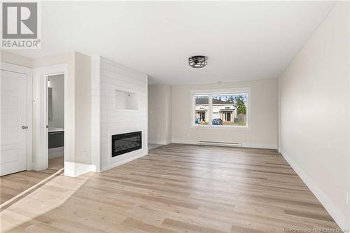 257 Falcon Drive, Moncton, NB - Indoor Photo Showing Living Room With Fireplace