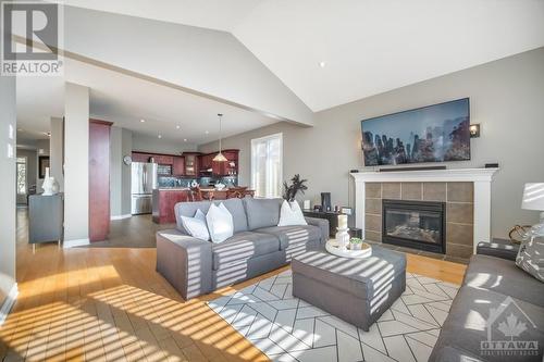 64 Hartsmere Drive, Ottawa, ON - Indoor Photo Showing Living Room With Fireplace