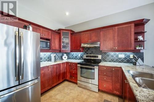 64 Hartsmere Drive, Ottawa, ON - Indoor Photo Showing Kitchen With Double Sink