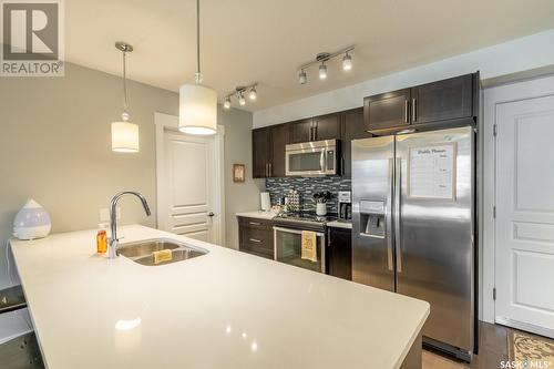 117 5301 Universal Crescent, Regina, SK - Indoor Photo Showing Kitchen With Double Sink With Upgraded Kitchen