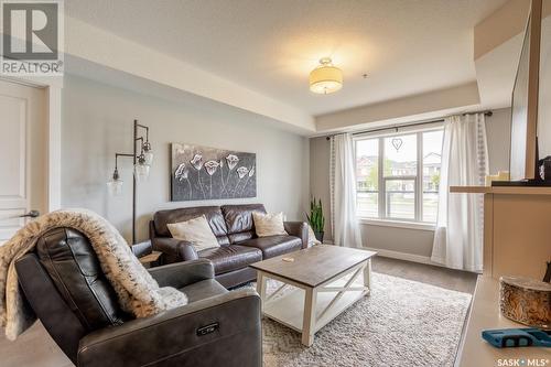 117 5301 Universal Crescent, Regina, SK - Indoor Photo Showing Living Room