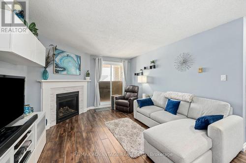 304 - 727 Deveron Crescent, London, ON - Indoor Photo Showing Living Room With Fireplace