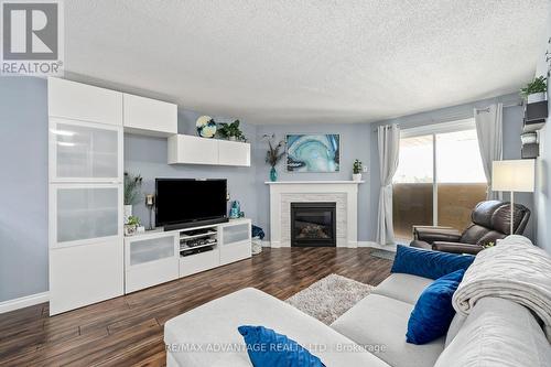 304 - 727 Deveron Crescent, London, ON - Indoor Photo Showing Living Room With Fireplace