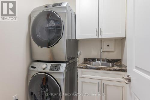 408 - 58 Glenelg Street W, Kawartha Lakes, ON - Indoor Photo Showing Laundry Room