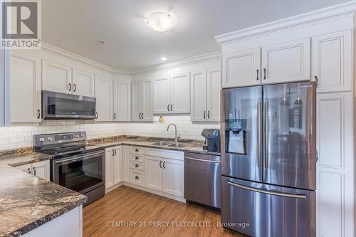 408 - 58 Glenelg Street W, Kawartha Lakes, ON - Indoor Photo Showing Kitchen With Double Sink