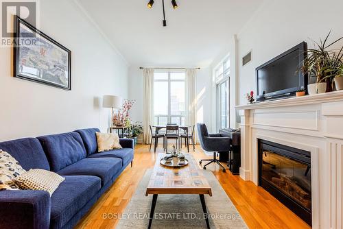 Ph09 - 2083 Lake Shore Boulevard W, Toronto (Mimico), ON - Indoor Photo Showing Living Room With Fireplace