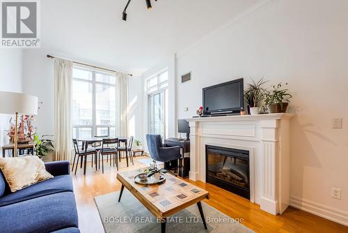 Ph09 - 2083 Lake Shore Boulevard W, Toronto (Mimico), ON - Indoor Photo Showing Living Room With Fireplace