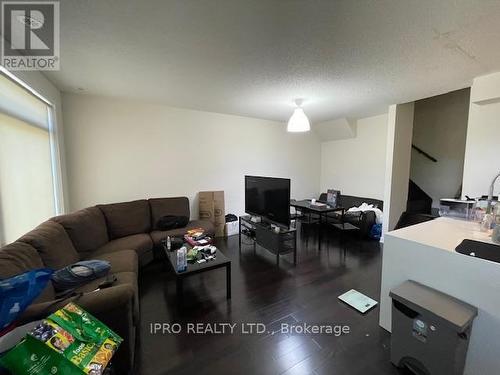 11 - 4030 Parkside Village Drive, Mississauga (City Centre), ON - Indoor Photo Showing Living Room