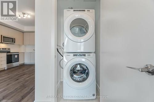 210 - 1440 Clarriage Court, Milton (Ford), ON - Indoor Photo Showing Laundry Room