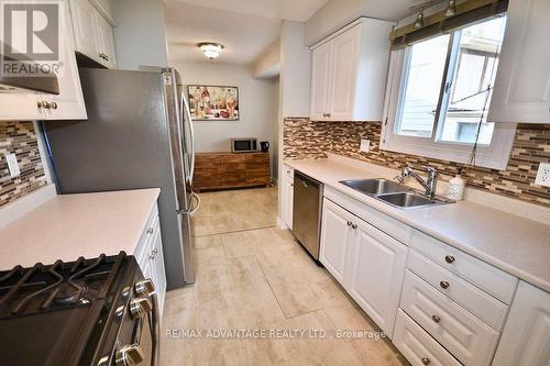 Kitchen view of Dinning area - 1800 Attawandaron Road, London, ON - Indoor Photo Showing Kitchen With Double Sink