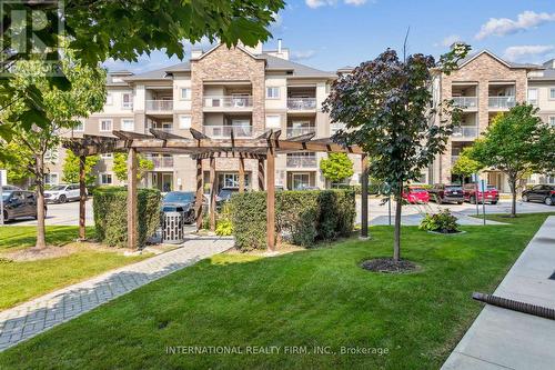 2113 - 6 Dayspring Circle, Brampton, ON - Outdoor With Balcony With Facade