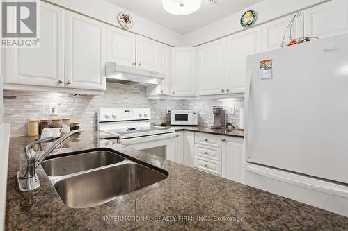 2113 - 6 Dayspring Circle, Brampton, ON - Indoor Photo Showing Kitchen With Double Sink