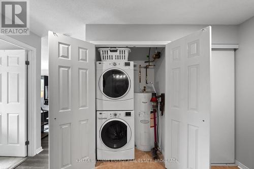 203 - 91 Aspen Springs Drive, Clarington (Bowmanville), ON - Indoor Photo Showing Laundry Room