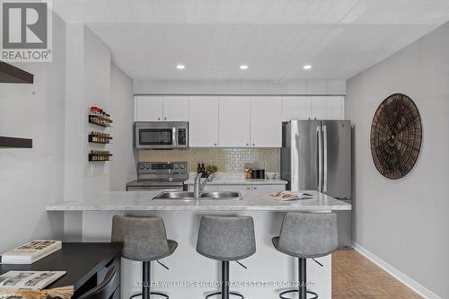 203 - 91 Aspen Springs Drive, Clarington (Bowmanville), ON - Indoor Photo Showing Kitchen With Stainless Steel Kitchen With Upgraded Kitchen