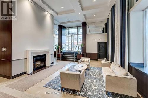 102 - 900 Mount Pleasant Road, Toronto, ON - Indoor Photo Showing Living Room With Fireplace