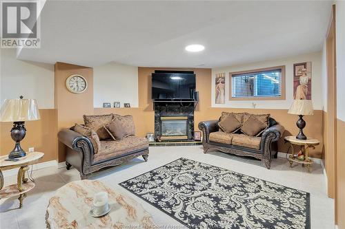 2660 Chateau, Windsor, ON - Indoor Photo Showing Living Room With Fireplace