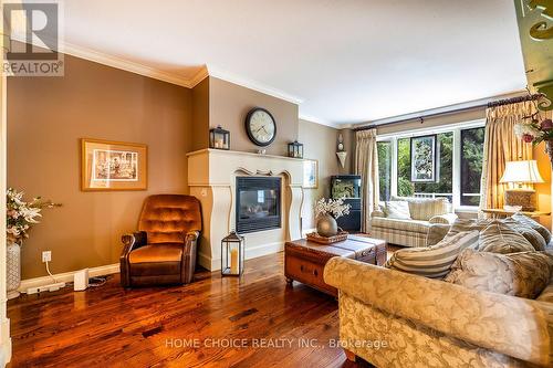 20 Andrew Street, Clarington (Newcastle), ON - Indoor Photo Showing Living Room With Fireplace