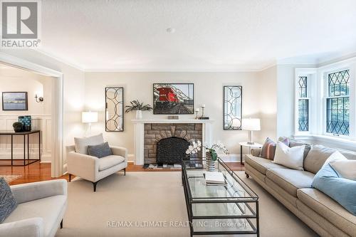 242 Bessborough Drive, Toronto, ON - Indoor Photo Showing Living Room With Fireplace