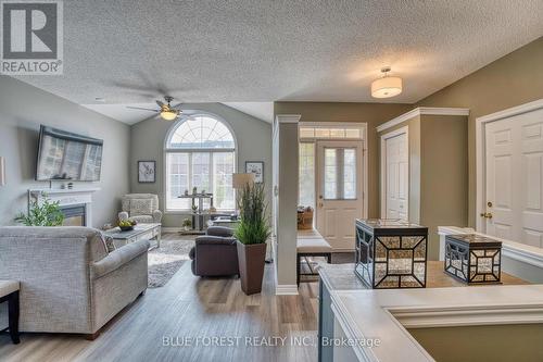 176 - 2025 Meadowgate Boulevard, London, ON - Indoor Photo Showing Living Room With Fireplace