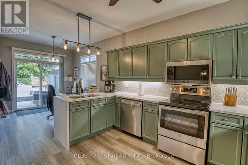 176 - 2025 Meadowgate Boulevard, London, ON - Indoor Photo Showing Kitchen With Double Sink