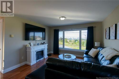 7-9 Jean, Saint John, NB - Indoor Photo Showing Living Room With Fireplace